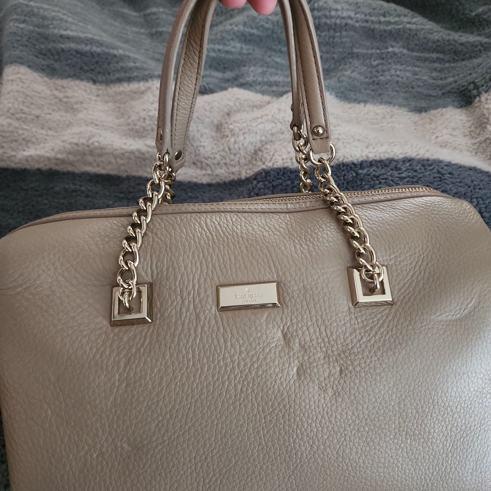 Kate Spade Beige Leather Satchel with Gold Accents.